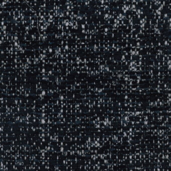 Woven teal fabric texture with white flecks, dense tweed-style pile, Turri brand label reading “781 m,” neutral background, even lighting.
